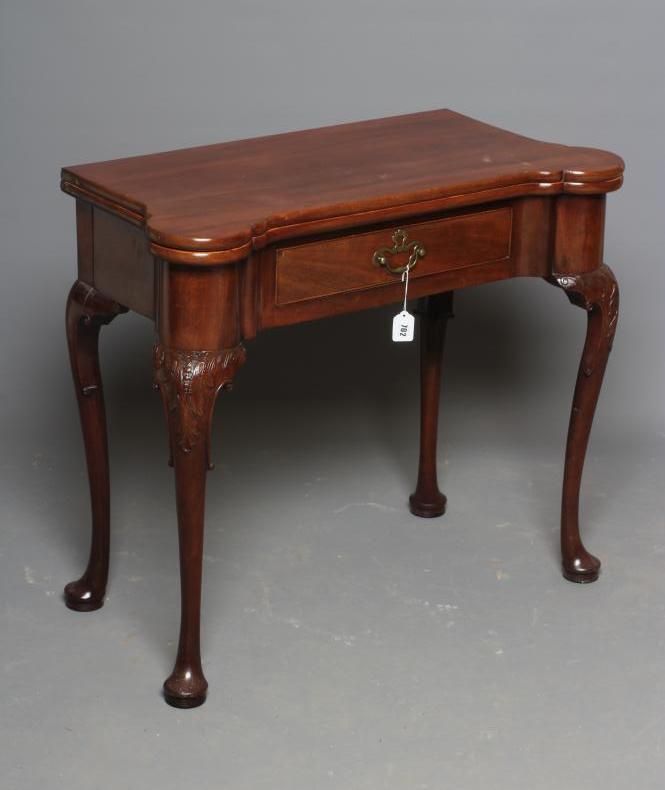 A GEORGIAN MAHOGANY FOLDING TEA TABLE Image