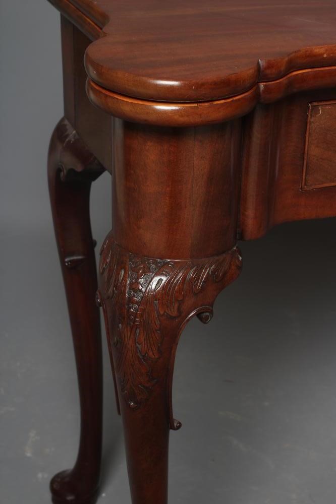 A GEORGIAN MAHOGANY FOLDING TEA TABLE Image