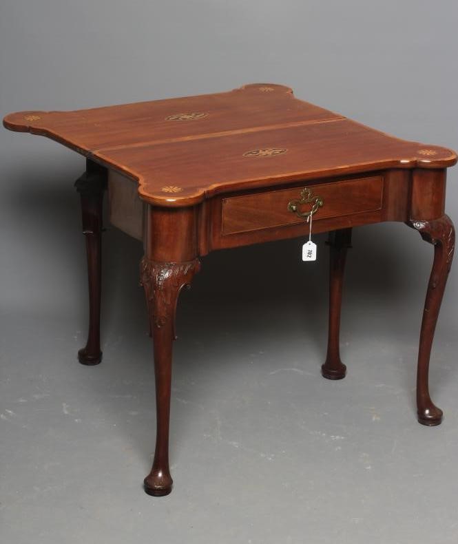 A GEORGIAN MAHOGANY FOLDING TEA TABLE Image