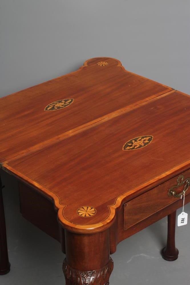 A GEORGIAN MAHOGANY FOLDING TEA TABLE Image