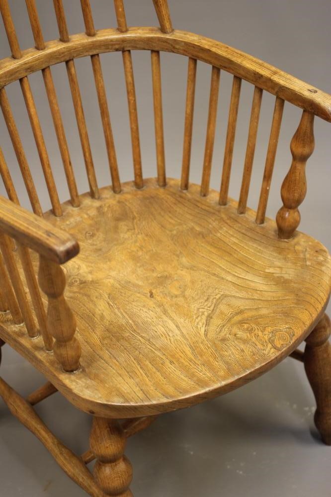 AN ASH AND ELM WINDSOR ARMCHAIR Image
