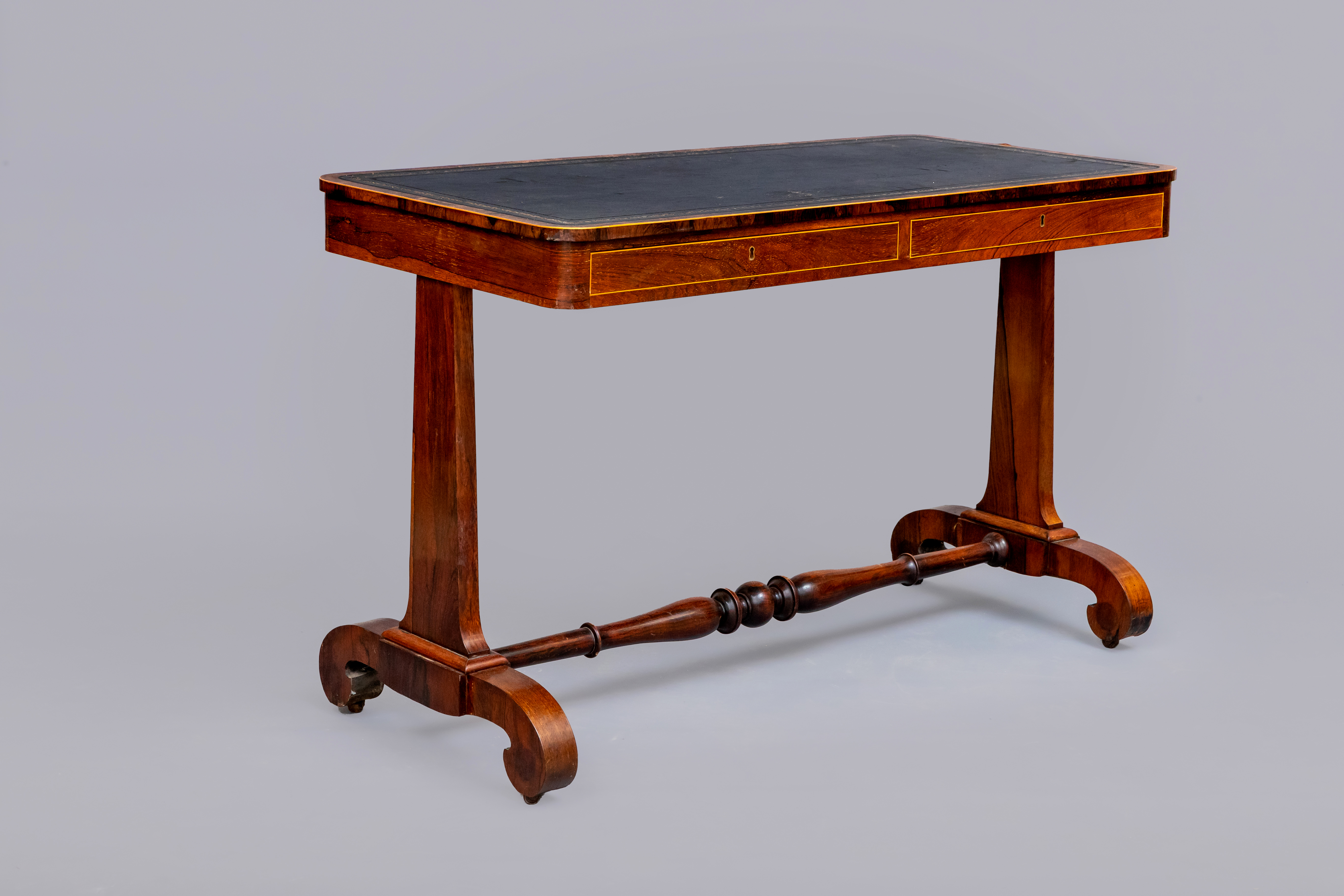 A VICTORIAN ROSEWOOD PILLAR END LIBRARY TABLE Image