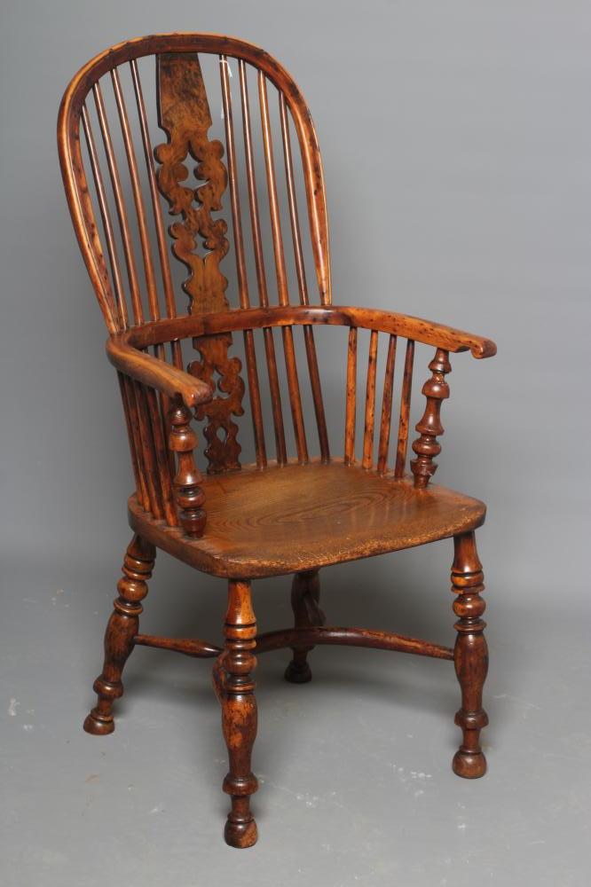 A YEW WOOD WINDSOR ARMCHAIR Image