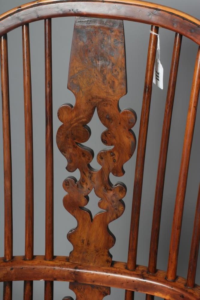 A YEW WOOD WINDSOR ARMCHAIR Image