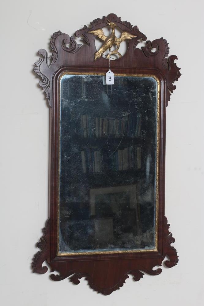 A MAHOGANY AND PARCEL GILT FRET PIER GLASS Image