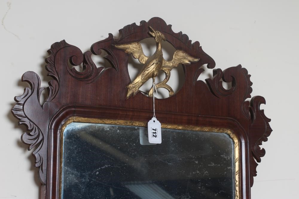 A MAHOGANY AND PARCEL GILT FRET PIER GLASS Image
