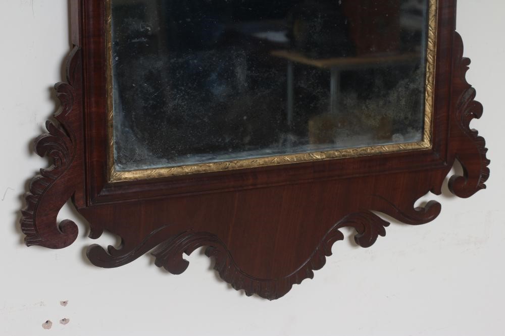 A MAHOGANY AND PARCEL GILT FRET PIER GLASS Image