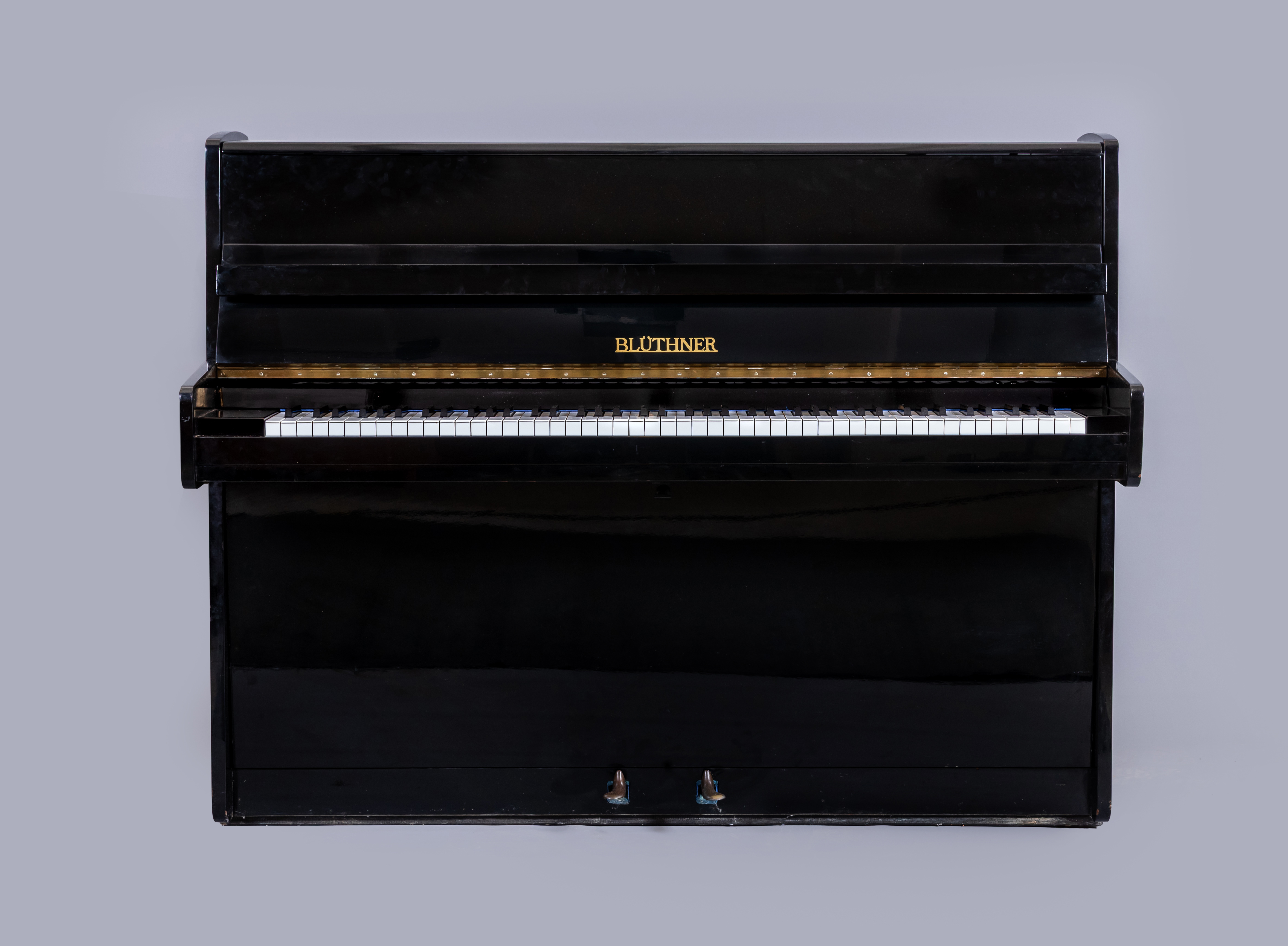 A BLUTHNER UPRIGHT PIANO, 1976, serial no. 28027, in full gloss ebonised case, 57" w, 22 1/4" d, 44 Image