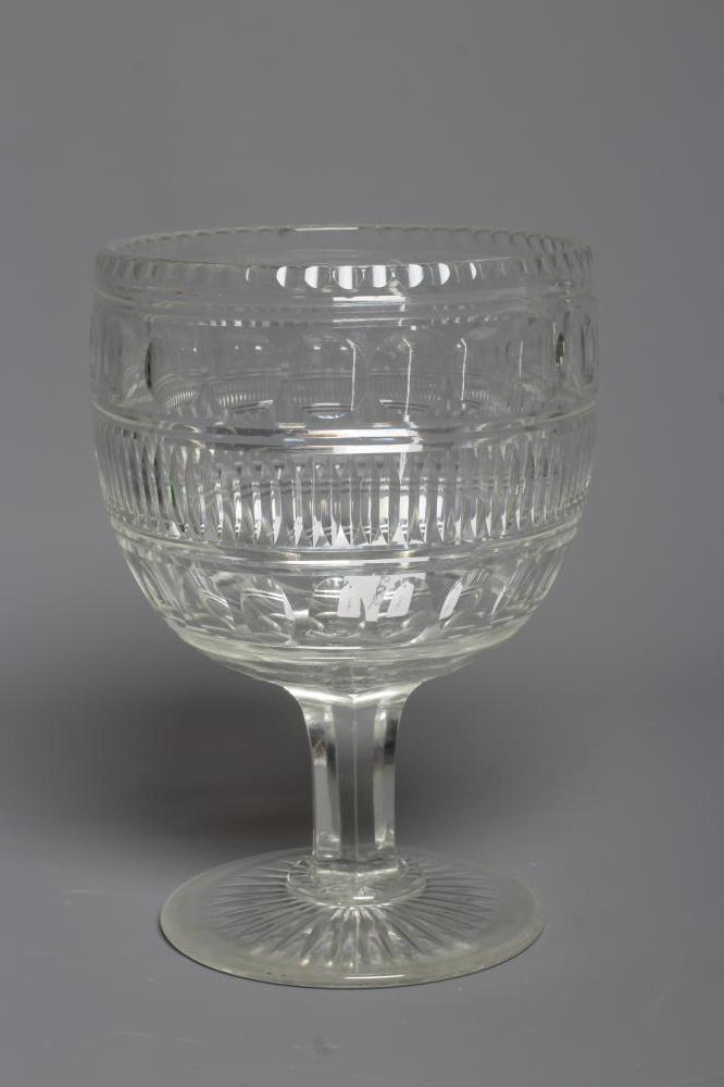 A WILLIAM IV LARGE GLASS GOBLET, the rounded bowl with printe and slice cut banding issuing from a Image