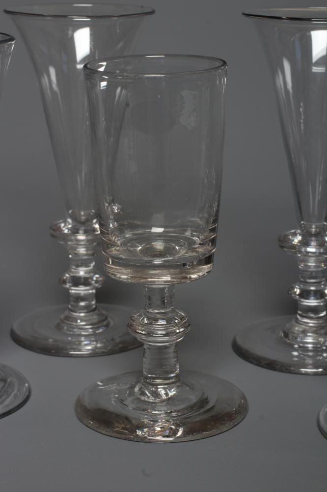A SET OF SIX GLASS CHAMPAGNE FLUTES Image