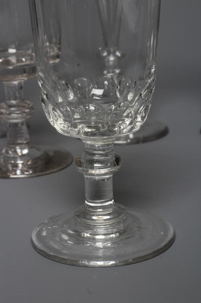 A SET OF SIX GLASS CHAMPAGNE FLUTES Image