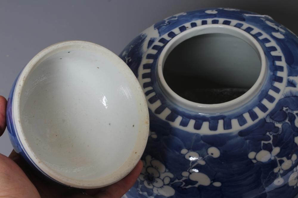 A CHINESE PORCELAIN LARGE JAR AND COVER painted in underglaze blue with cracked ice and prunus, six Image