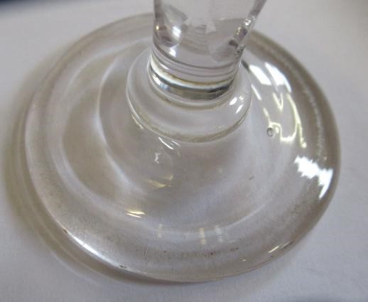 FIVE GEORGIAN CORDIAL GLASSES, five with panelled bowls, together with a Georgian dwarf candlestick Image