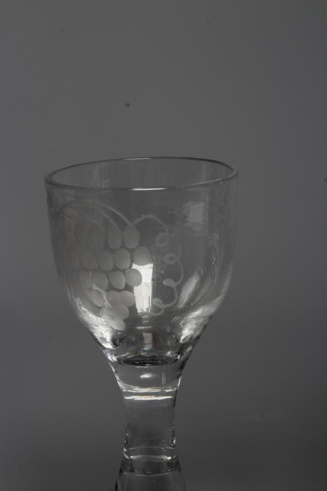 THREE GEORGIAN CORDIAL GLASSES comprising a round funnel bowl on plain cylindrical stem and folded Image
