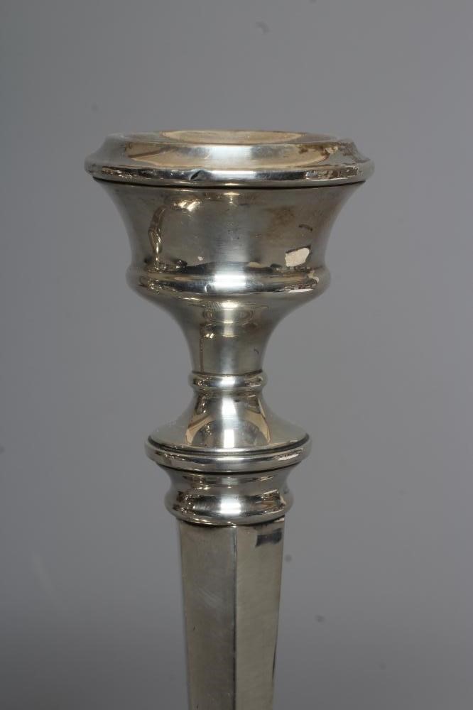 A PAIR OF ELIZABETH II SILVER CANDLESTICKS by Sanders & Mackenzie Image