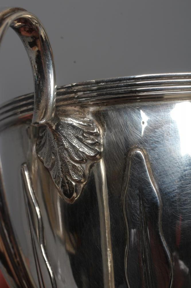 A GEORGE V ARTS AND CRAFTS SILVER CHRISTENING CUP by Wilson & Sharp Image