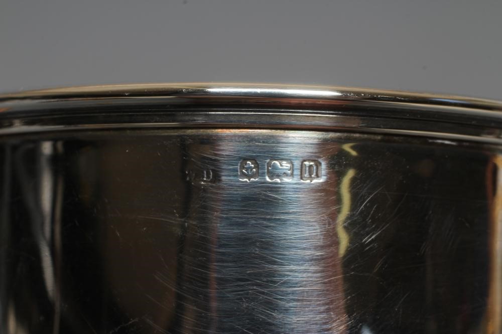 A PAIR OF GEORGE V SILVER TEA CUPS AND SAUCERS by William Devonport Image