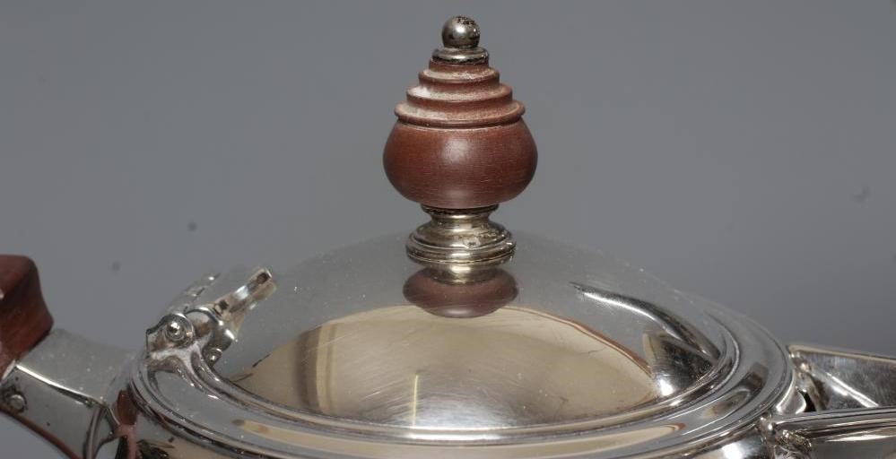 A GEORGE VI SILVER FOUR PIECE TEA SERVICE by Roberts & Belk Image