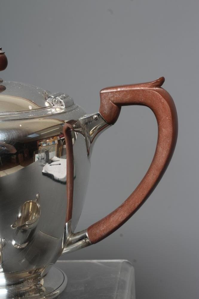 A GEORGE VI SILVER FOUR PIECE TEA SERVICE by Roberts & Belk Image