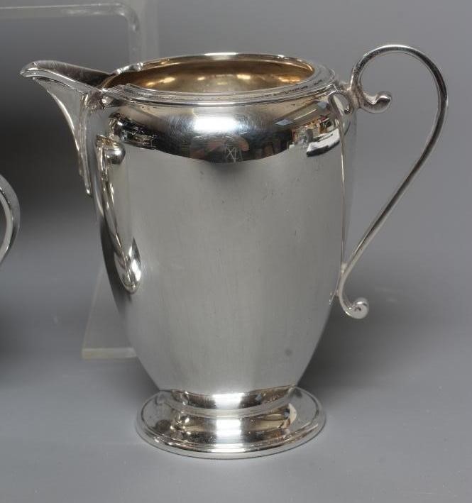 A GEORGE VI SILVER FOUR PIECE TEA SERVICE by Roberts & Belk Image