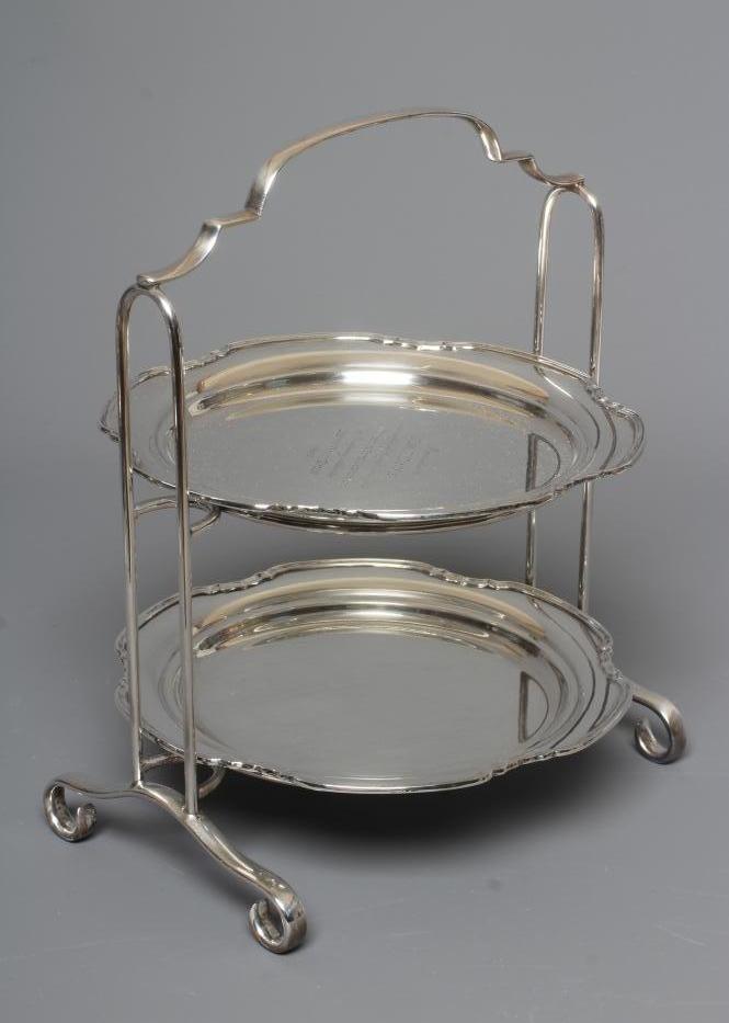 AN ELIZABETH II SILVER CAKE STAND by Ollivant & Botsford Ltd. Image