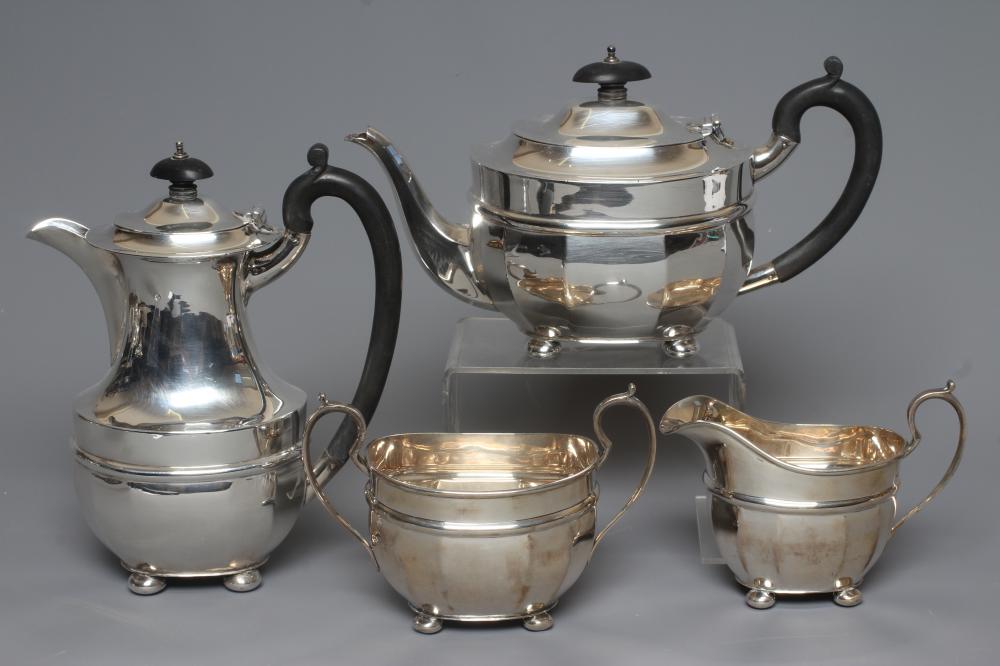 A GEORGE VI SILVER COMPOSITE FOUR PIECE TEA AND COFFEE SERVICE by S Blanckensee & Son Ltd. Image