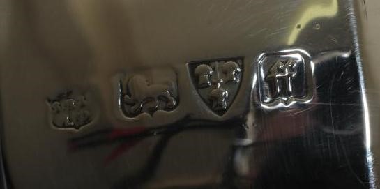 A GEORGE VI SILVER COMPOSITE FOUR PIECE TEA AND COFFEE SERVICE by S Blanckensee & Son Ltd. Image