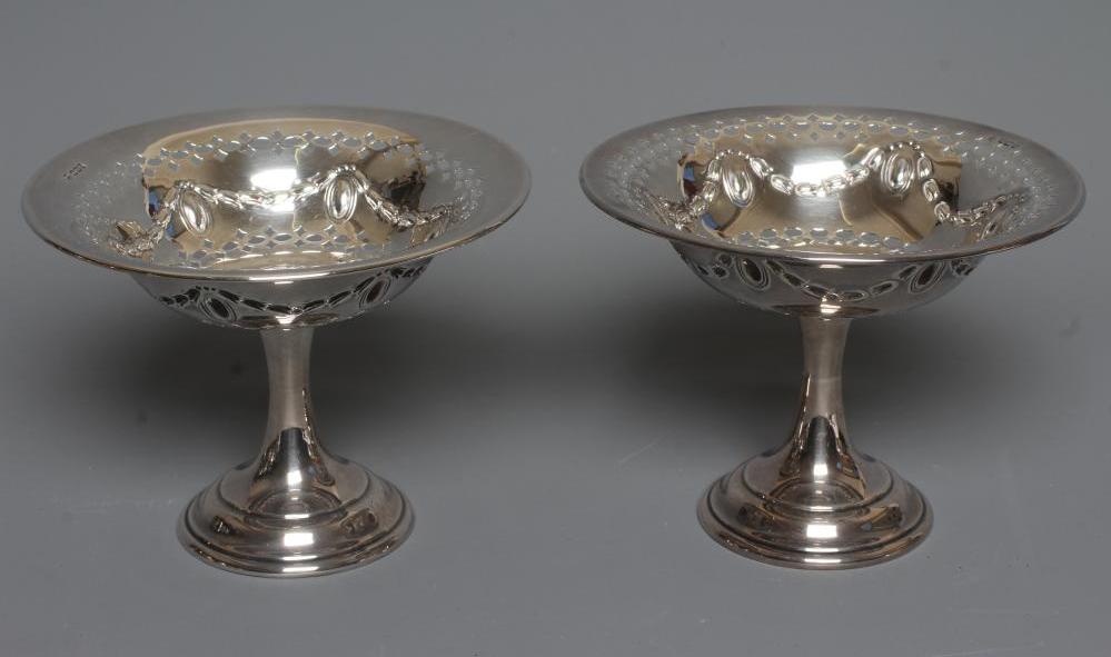 A GEORGE V SILVER COMPOSITE PAIR OF SMALL TAZZE by Thomas Bradbury & Sons Image