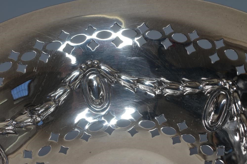 A GEORGE V SILVER COMPOSITE PAIR OF SMALL TAZZE by Thomas Bradbury & Sons Image