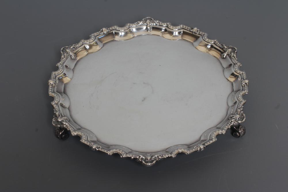 AN ELIZABETH II SILVER SMALL SALVER by Mappin & Webb Image