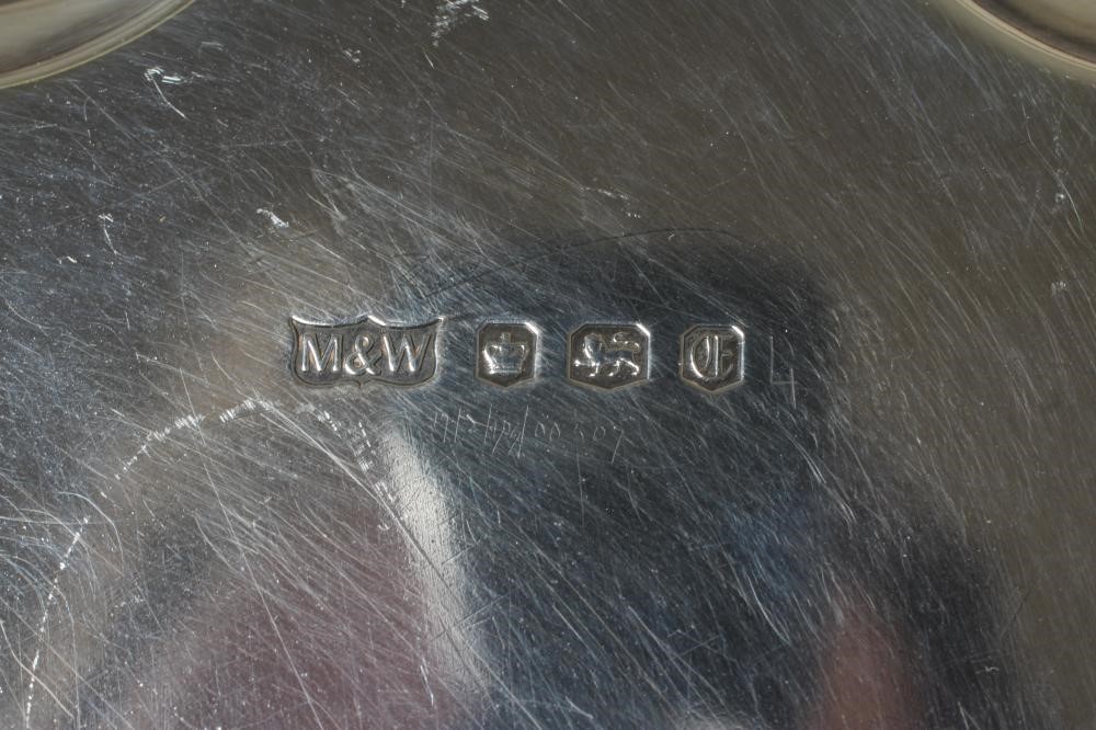AN ELIZABETH II SILVER SMALL SALVER by Mappin & Webb Image