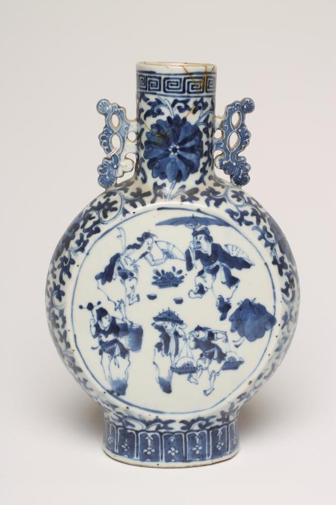 A CHINESE PORCELAIN MOONFLASK painted in underglaze blue with two roundels enclosing travelling Image