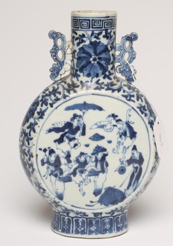 A CHINESE PORCELAIN MOONFLASK painted in underglaze blue with two roundels enclosing travelling Image