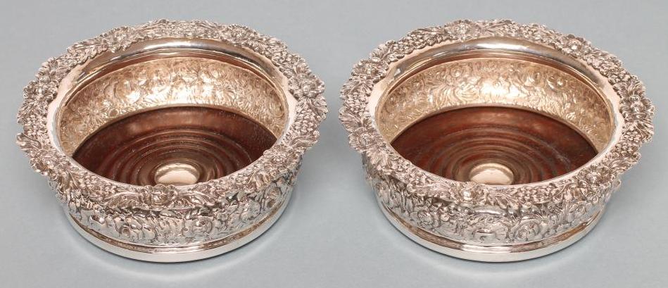 A PAIR OF EARLY VICTORIAN SILVER DECANTER COASTERS Image