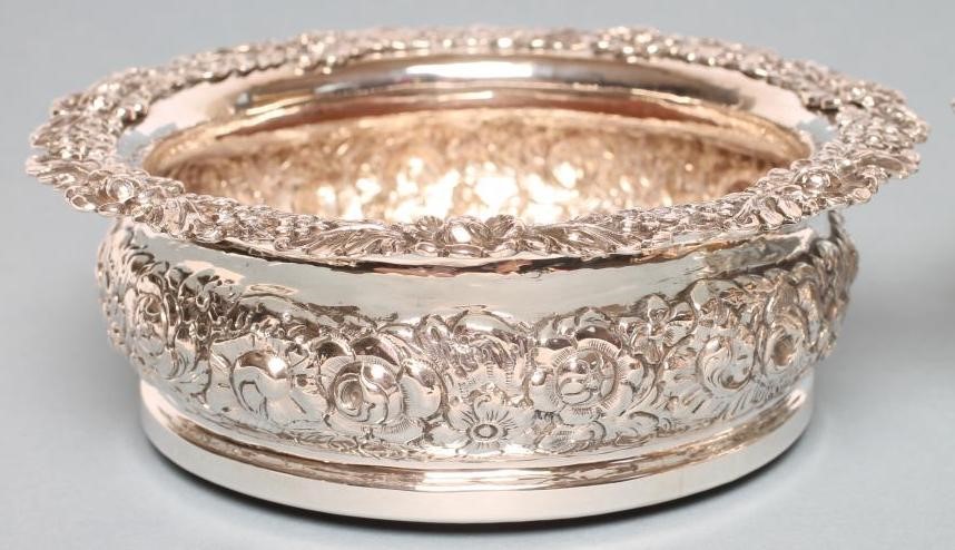 A PAIR OF EARLY VICTORIAN SILVER DECANTER COASTERS Image