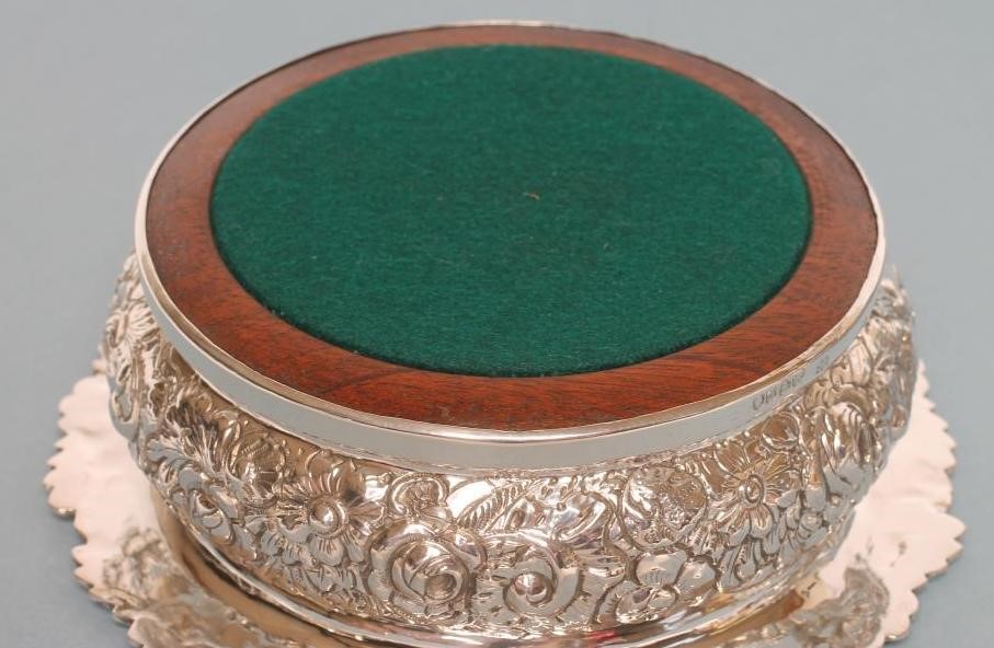 A PAIR OF EARLY VICTORIAN SILVER DECANTER COASTERS Image