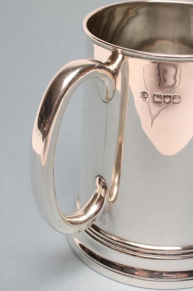 A LATE VICTORIAN SILVER MUG Image