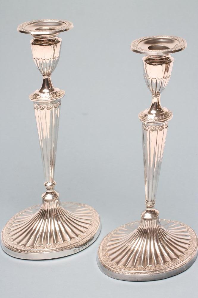 A PAIR OF GEORGE III SILVER CANDLESTICKS Image