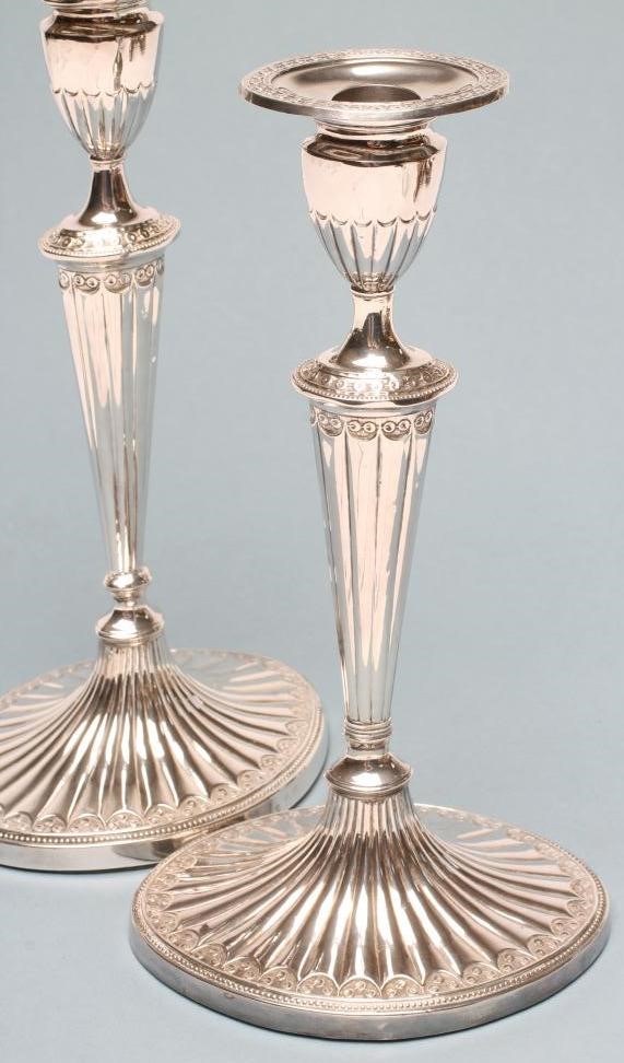 A PAIR OF GEORGE III SILVER CANDLESTICKS Image