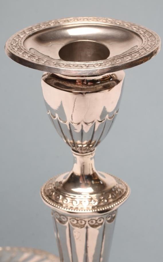 A PAIR OF GEORGE III SILVER CANDLESTICKS Image