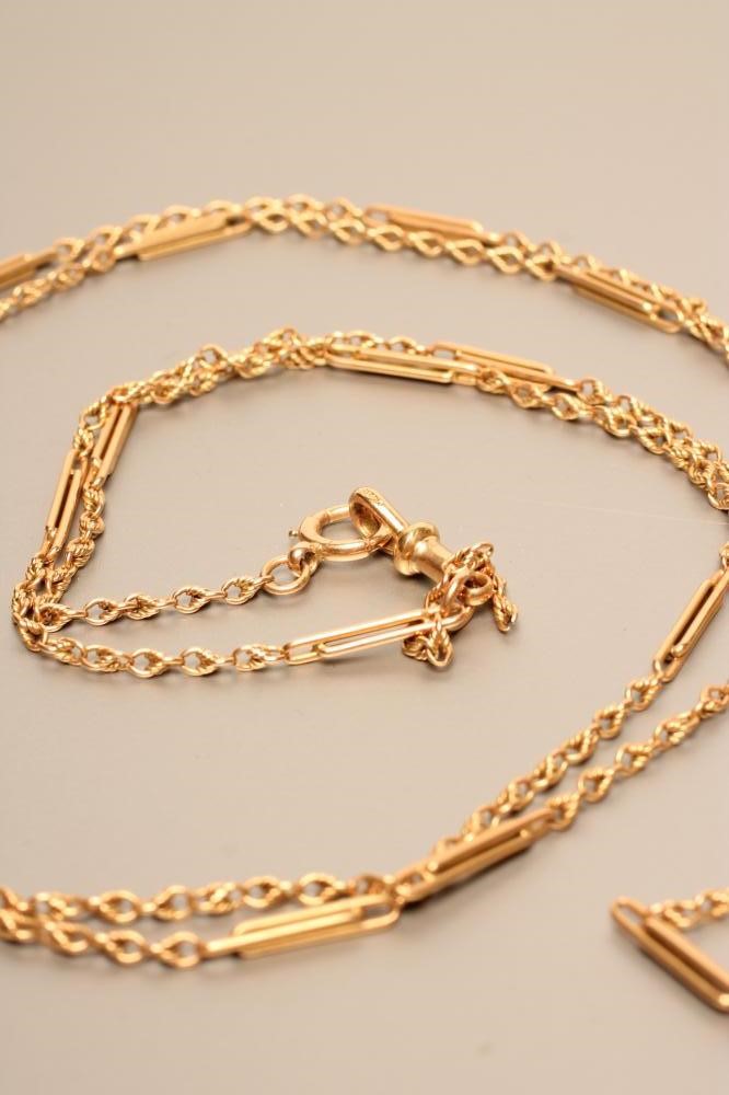 A GOLD MUFF CHAIN Image