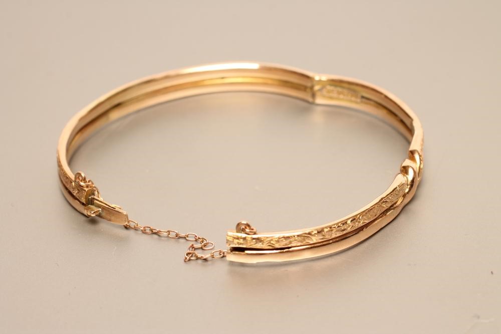 AN EDWARDIAN STIFF HINGED BANGLE Image