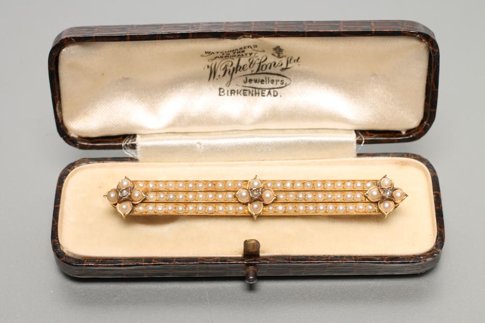 A VICTORIAN SEED PEARL TRIPLE BAR BROOCH Image