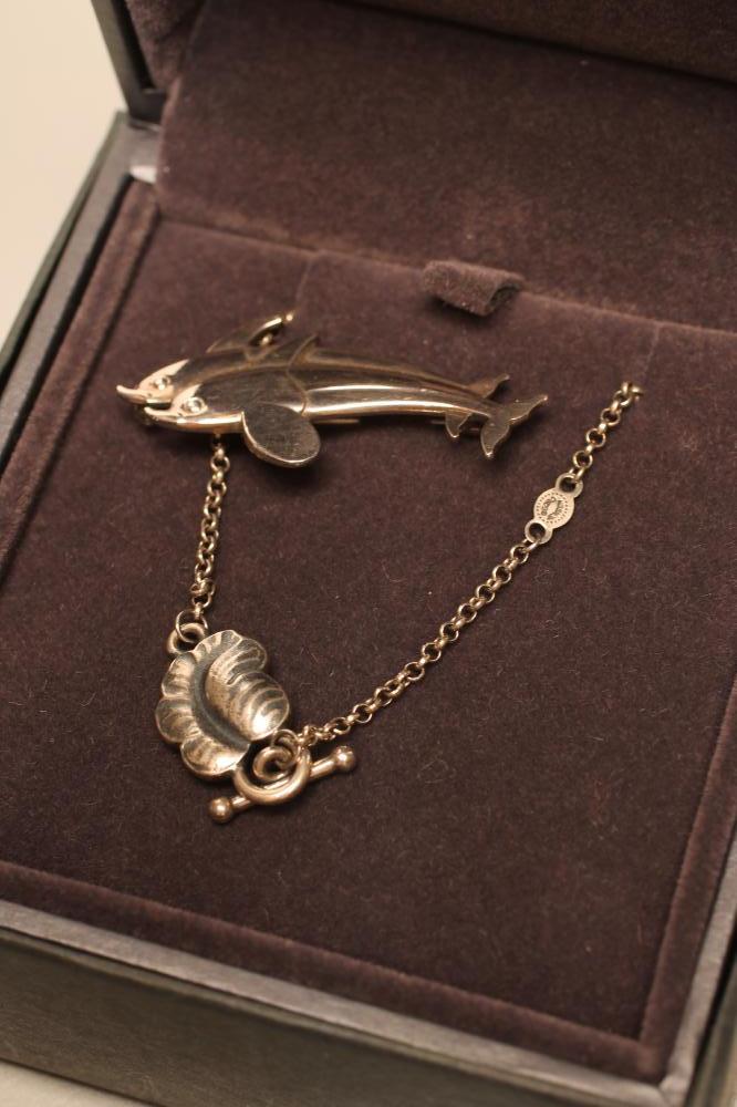 A GEORG JENSEN DOLPHIN BROOCH Image