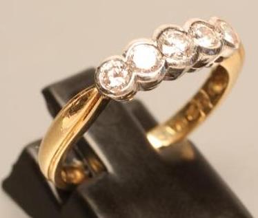 A FIVE STONE DIAMOND RING Image