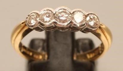 A FIVE STONE DIAMOND RING Image