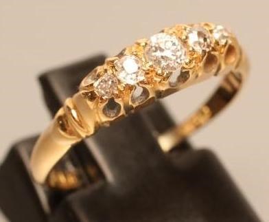 A VICTORIAN FIVE STONE DIAMOND RING Image