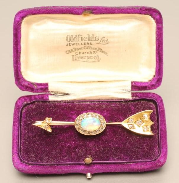 A VICTORIAN OPAL AND DIAMOND ARROW BROOCH Image