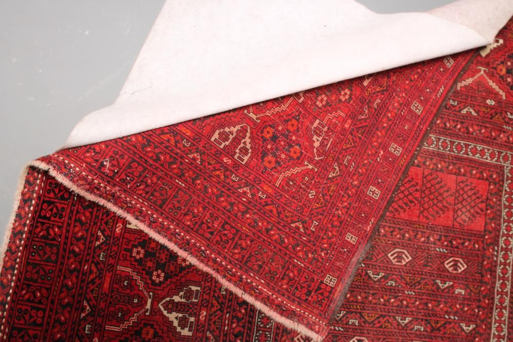 AN AFGHAN RUG in yellow Image