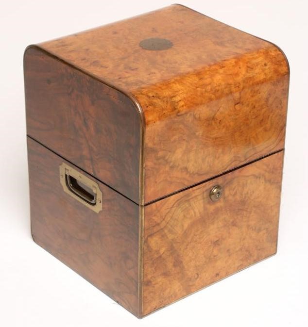 A VICTORIAN BURR WALNUT AND BRASS MOUNTED DECANTER BOX of square form with brass campaign carrying Image